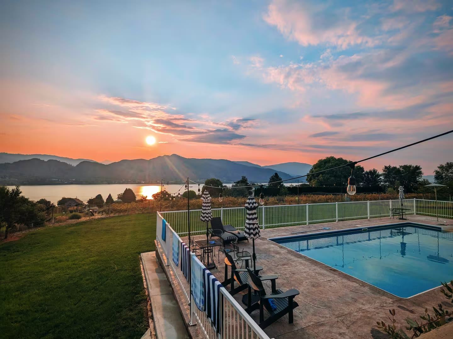 Private pool at sunset overlooking Lake Osoyoos